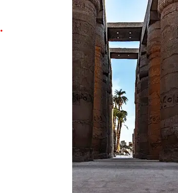 Karnak Temple columns lit at sunset in Luxor, Egypt