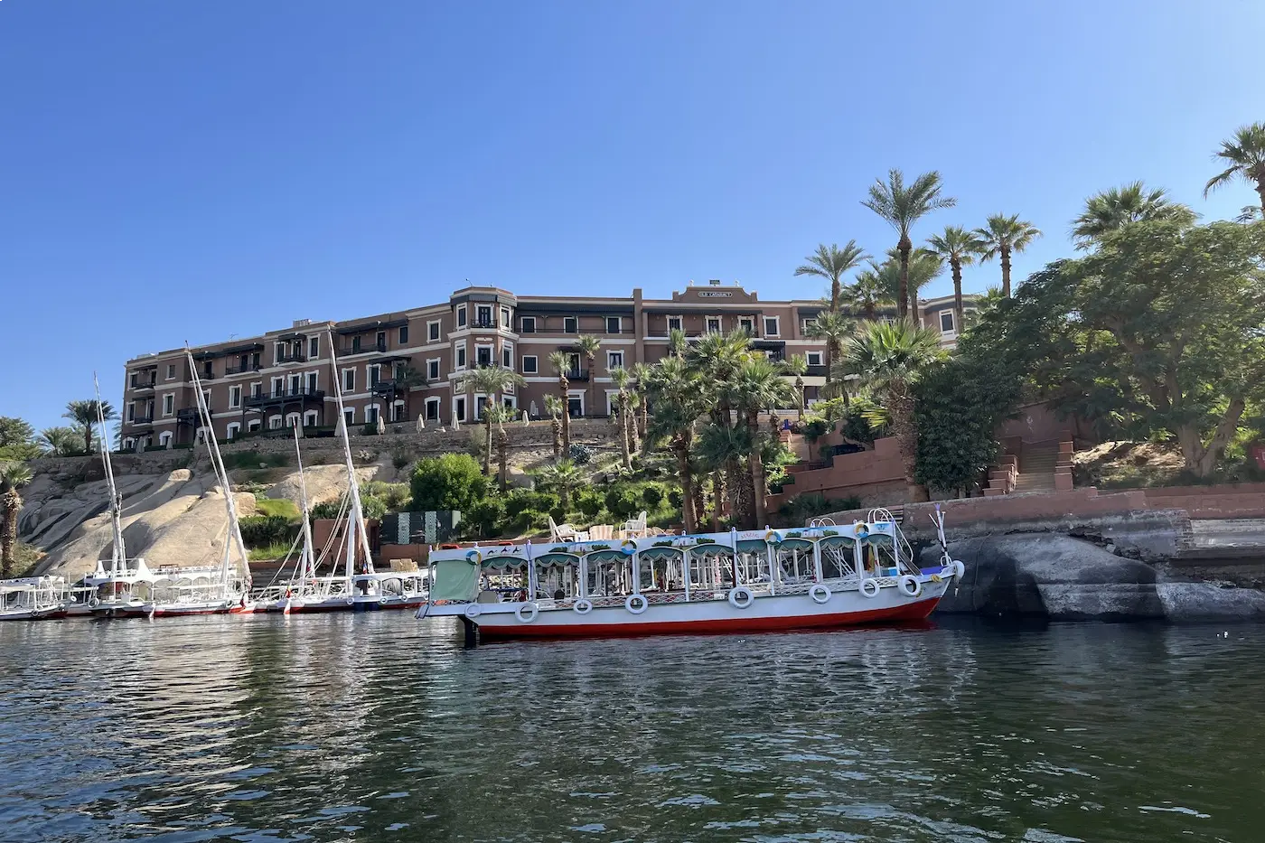 Historic riverside hotel terrace in Aswan on a luxury escape to Egypt